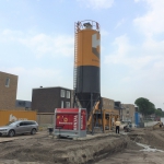 Productie CSM-wand strak langs de rooilijn van een nieuwbouw blok, Piushaven te Tilburg