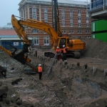 Over de kop boren van groutankers door de CSM-wand