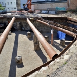 Uitgraven boouwkuip met stempelraam en funderingspalen