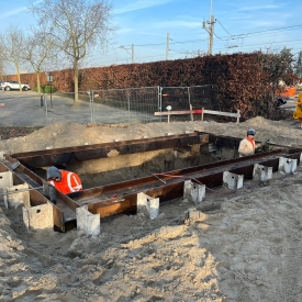 Assemble a steel frame in a small cofferdam